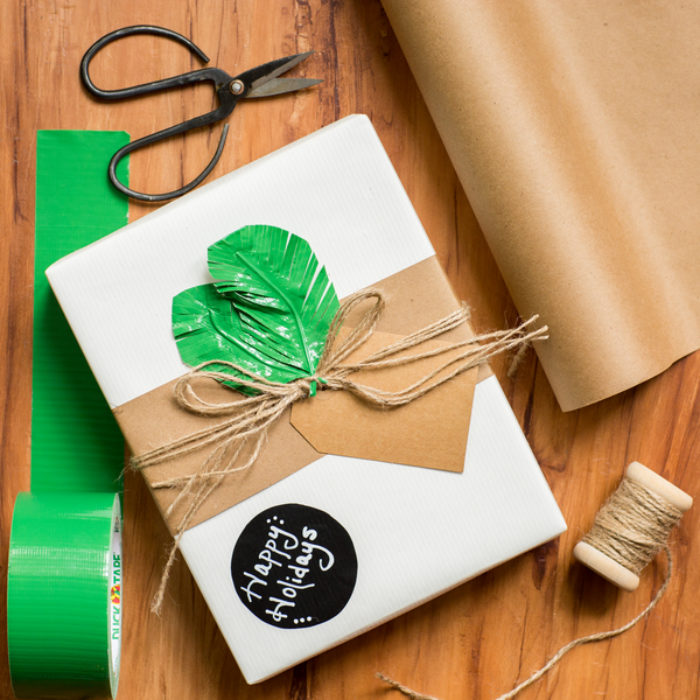 A present decorated with green Duck Tape leaves.