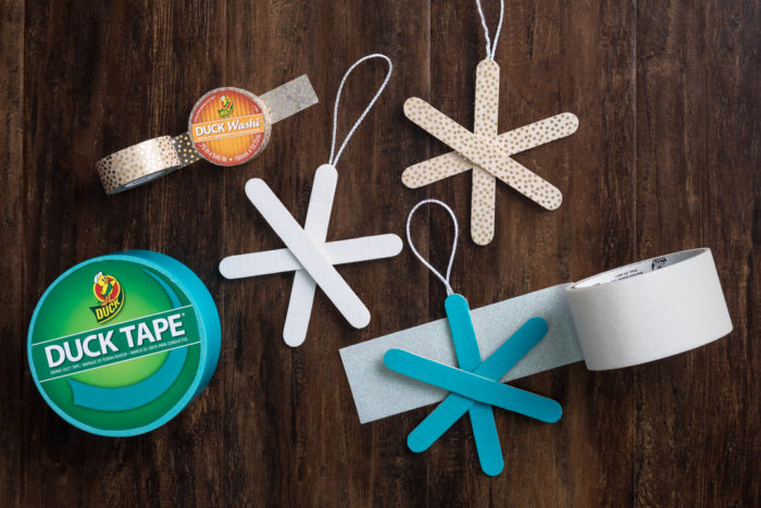 Popsicle snowflakes and rolls of colored Duck Tape