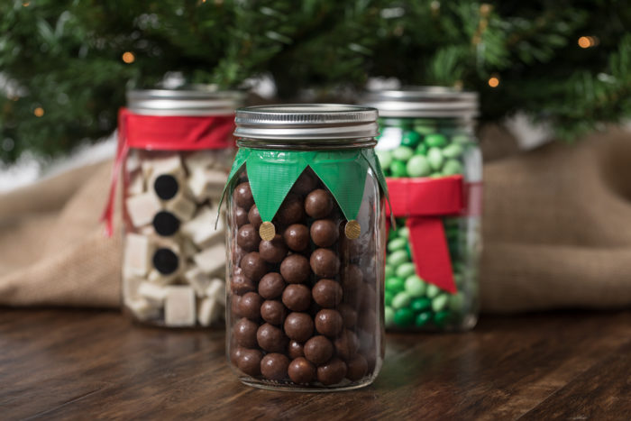 A elf decoration made form Duck Tape and a mason jar.