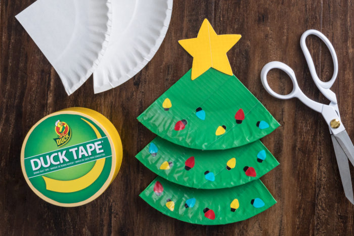 Paper plate Christmas Christmas tree with a yellow star made out of Duck tape.