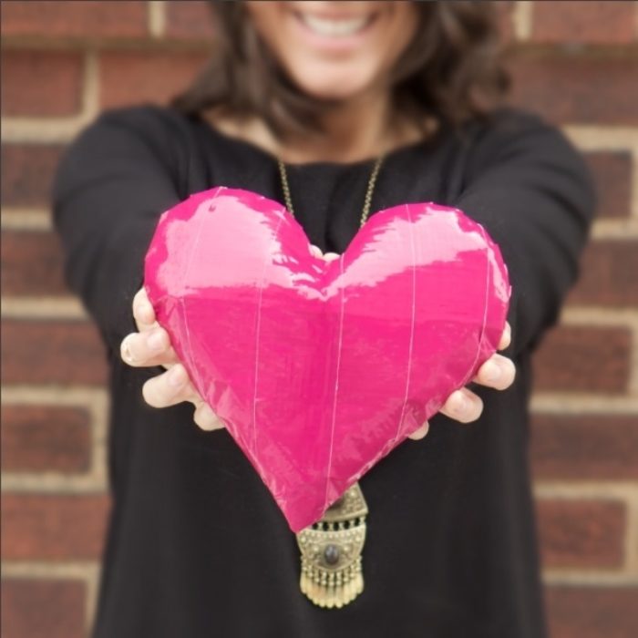 A 3D heart made out of pink Duck Tape
