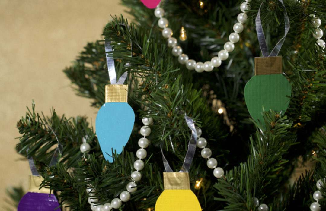 Completed  Duck Tape® Christmas Light Tree Décor hanging on a tree