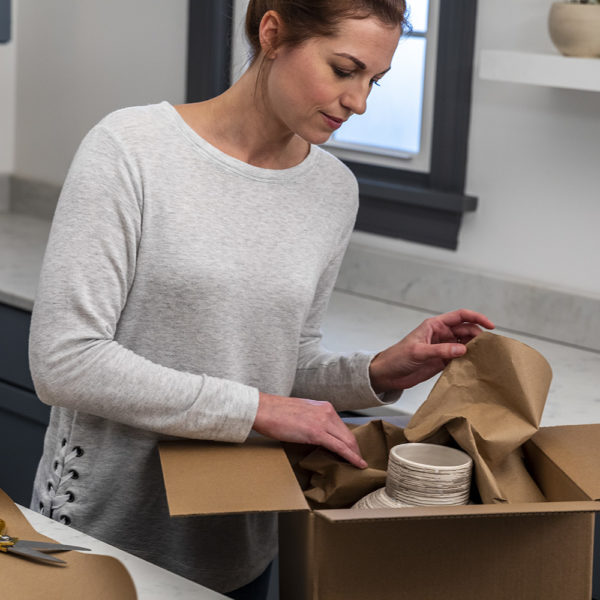 Woman packing a box