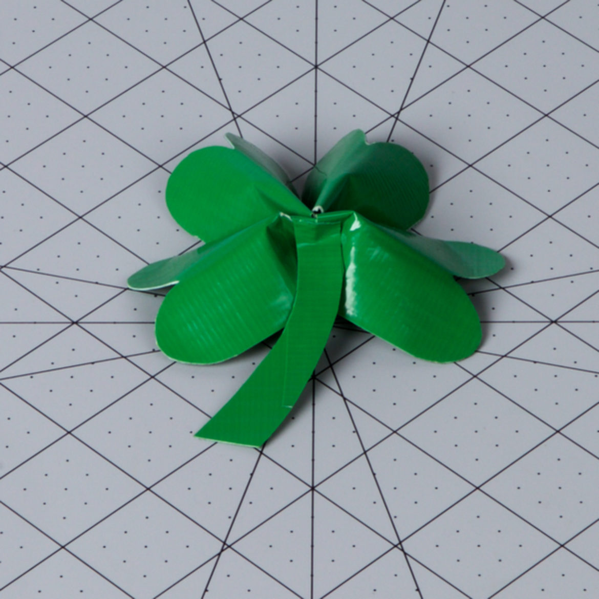 Stem added to the center of the back of the clover to serve as the stem