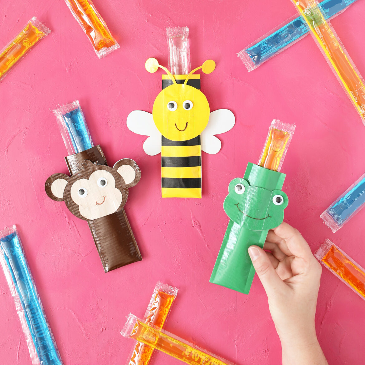 Three popsicle coozies in the shape of a Monkey, Frog and Bee.