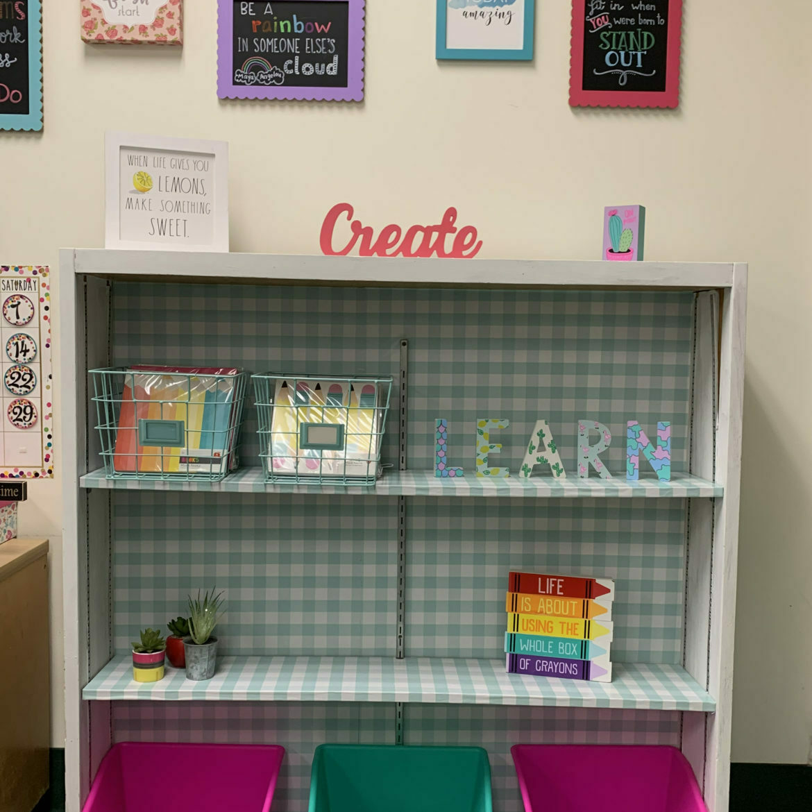 Bookshelf with blue shelves and colorful décor