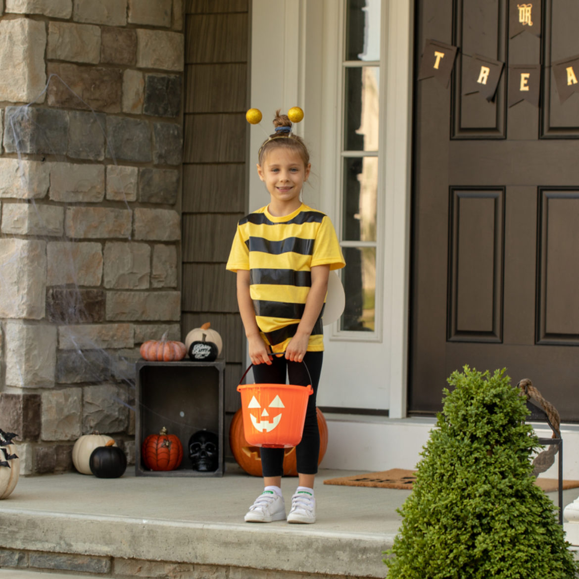 Girl wearing a completed Duck Tape® Bee Costume