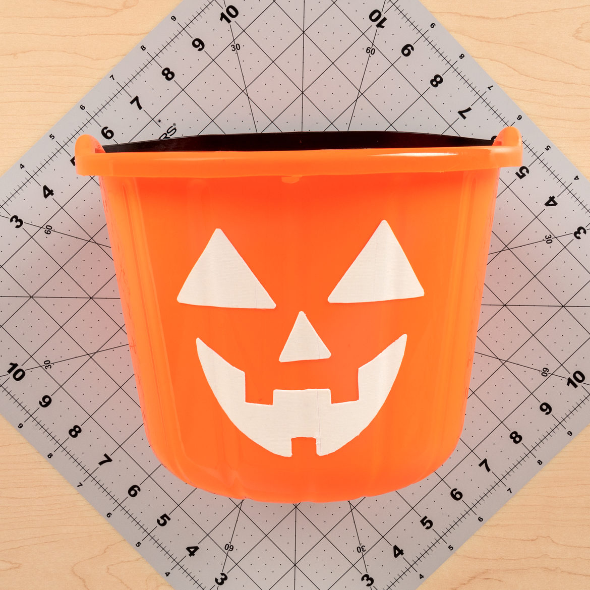 Face from previous steps attached to the front of a bucket