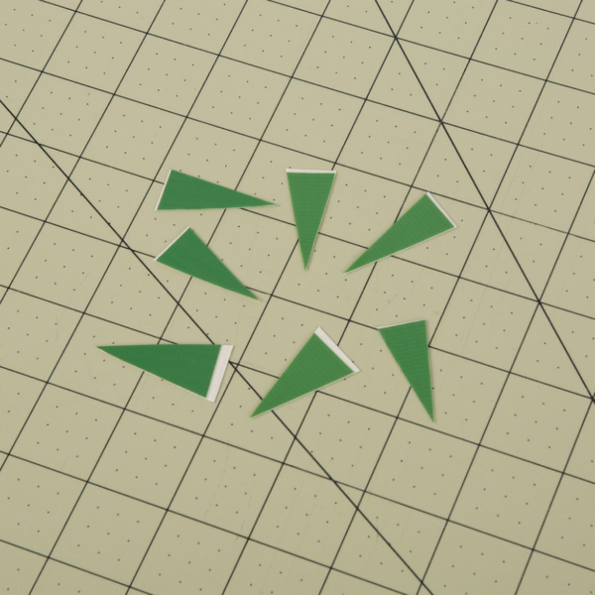 7 green Duck Tape triangles