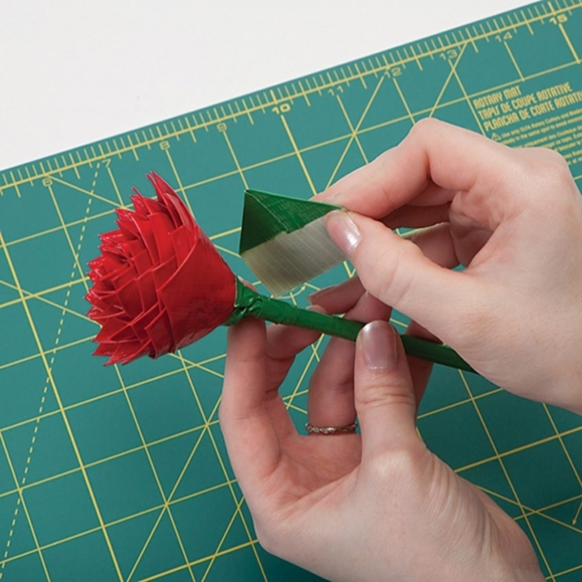 petals formed in the same way as before, but in the same color as what was used to wrap the pen, wrapped around the bottom of all of the rose petals