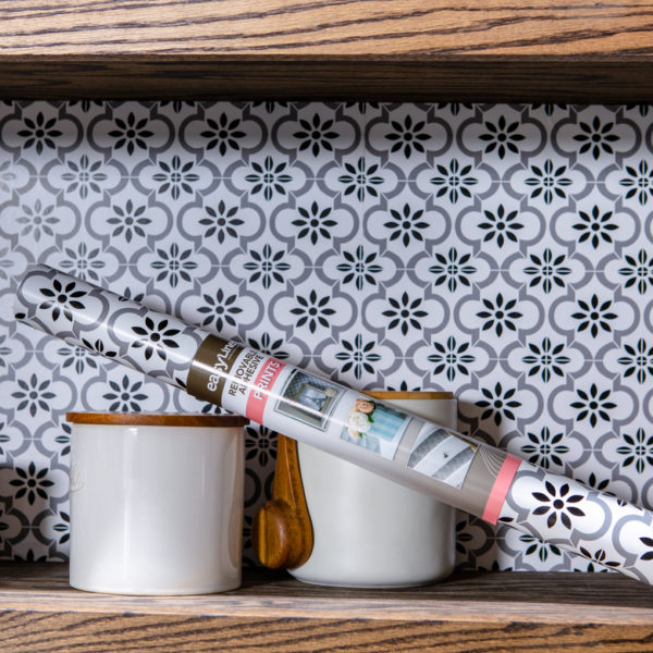 EasyLiner Adhesive prints shelf liner applied to kitchen pantry shelves.