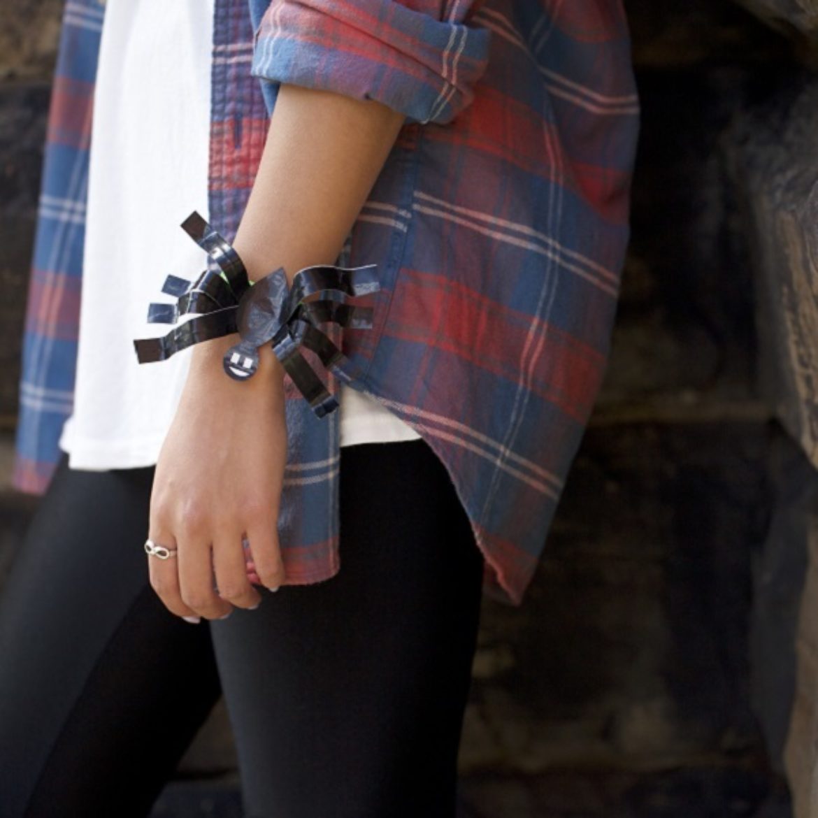 Woman wearing a completed Duck Tape® Spider Bracelet