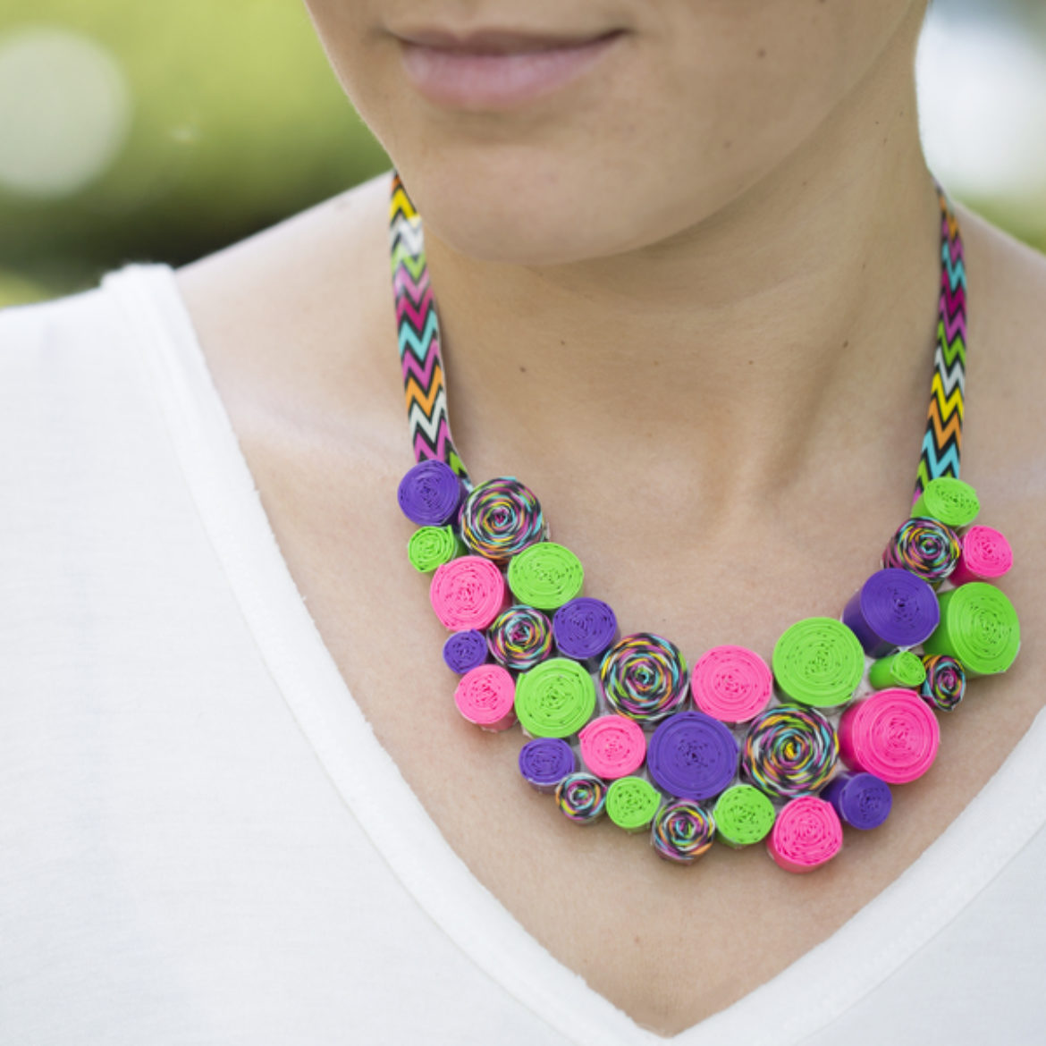 Woman wearing a completed Duck Tape® Swirl Necklace